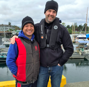 Safety advisor Trung Nguyen (left) wearing  a Mustang vest style PFD, with Ryan Ford.