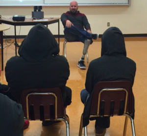 Micheal Lovett shares his story with students at Nlakapmux Independent School in Lytton, BC