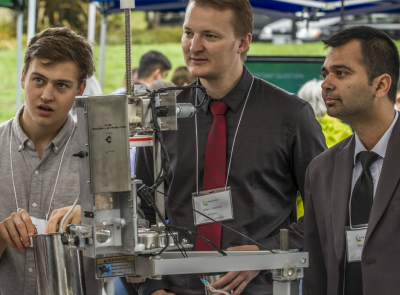 Pictured here are three of the five Camosun College students who made a cookie dough dispenser. Photo credit: Camosun AV department
