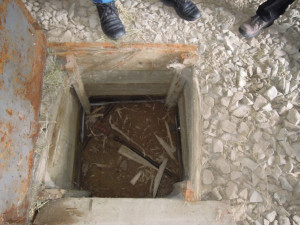 Below-ground valve box at a dairy farm. Image from WorkSafeBC