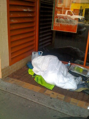 Sleeping outside on Commercial Drive in Vancouver BC, Nov. 2010. S. Main phot